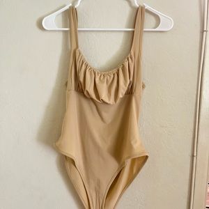 Nude body suit